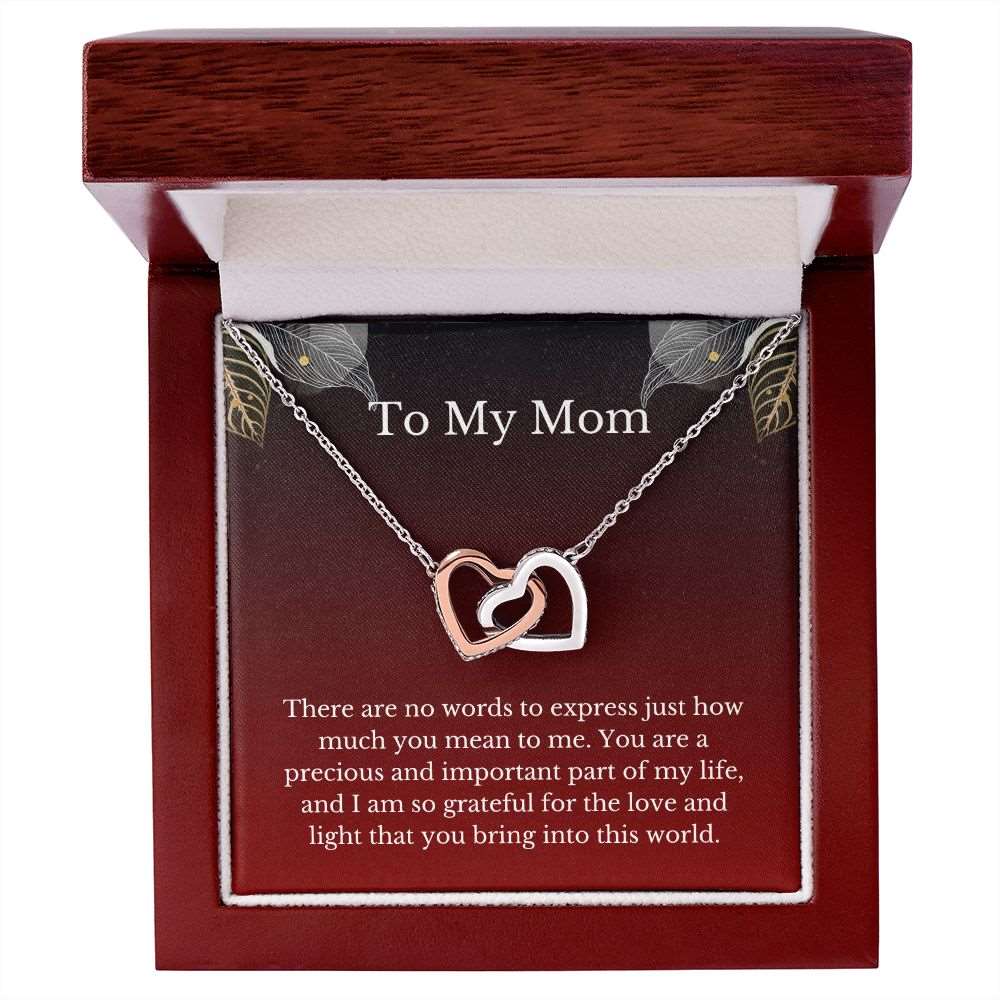 To My Mom. Interlocking Hearts Necklace. - www.gemmacraft.com. Gift to mother. Gold, stainless steel