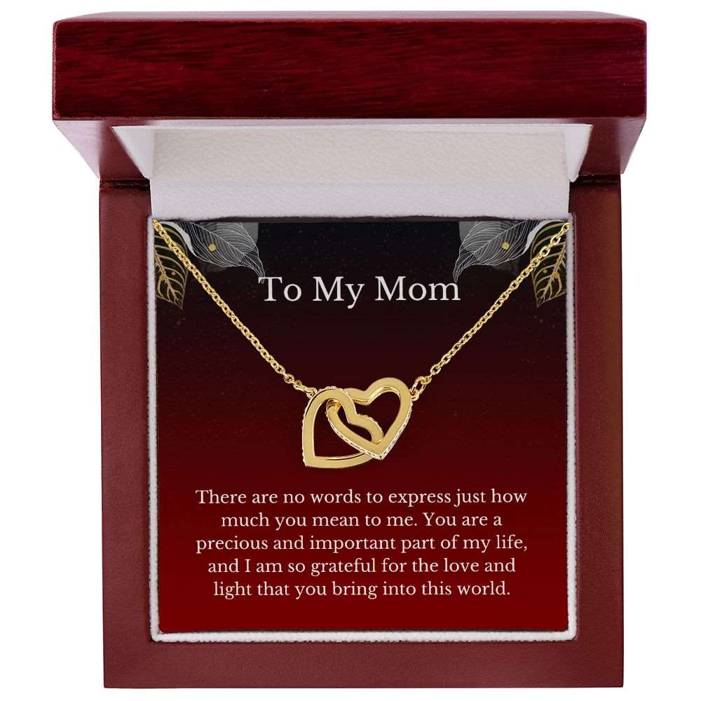 To My Mom. Interlocking Hearts Necklace. - www.gemmacraft.com. Gift to mother. Gold, stainless steel